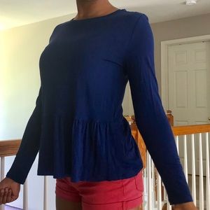 blue long sleeved flowy shirt